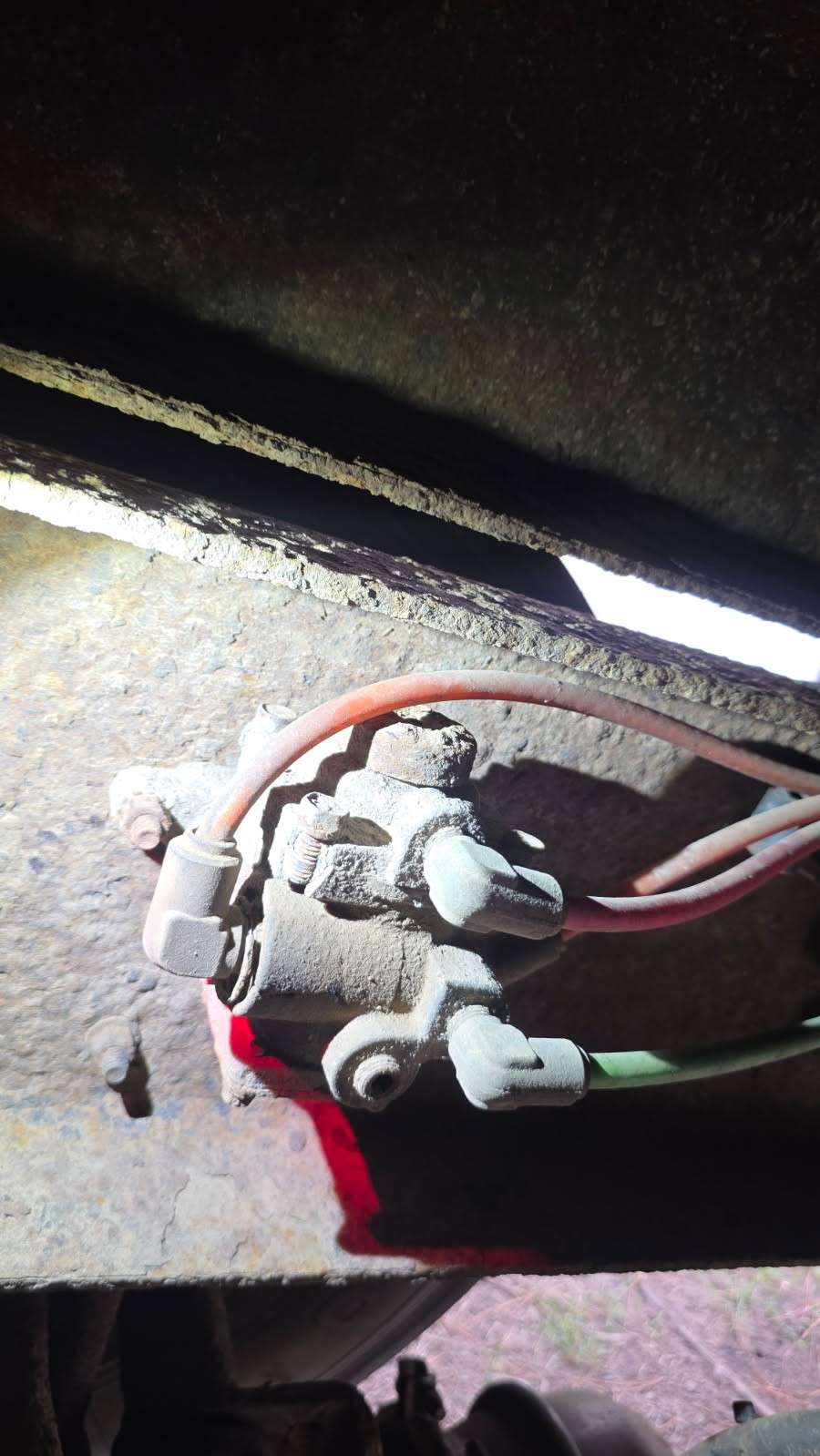 ABS valve and wiring under a truck frame