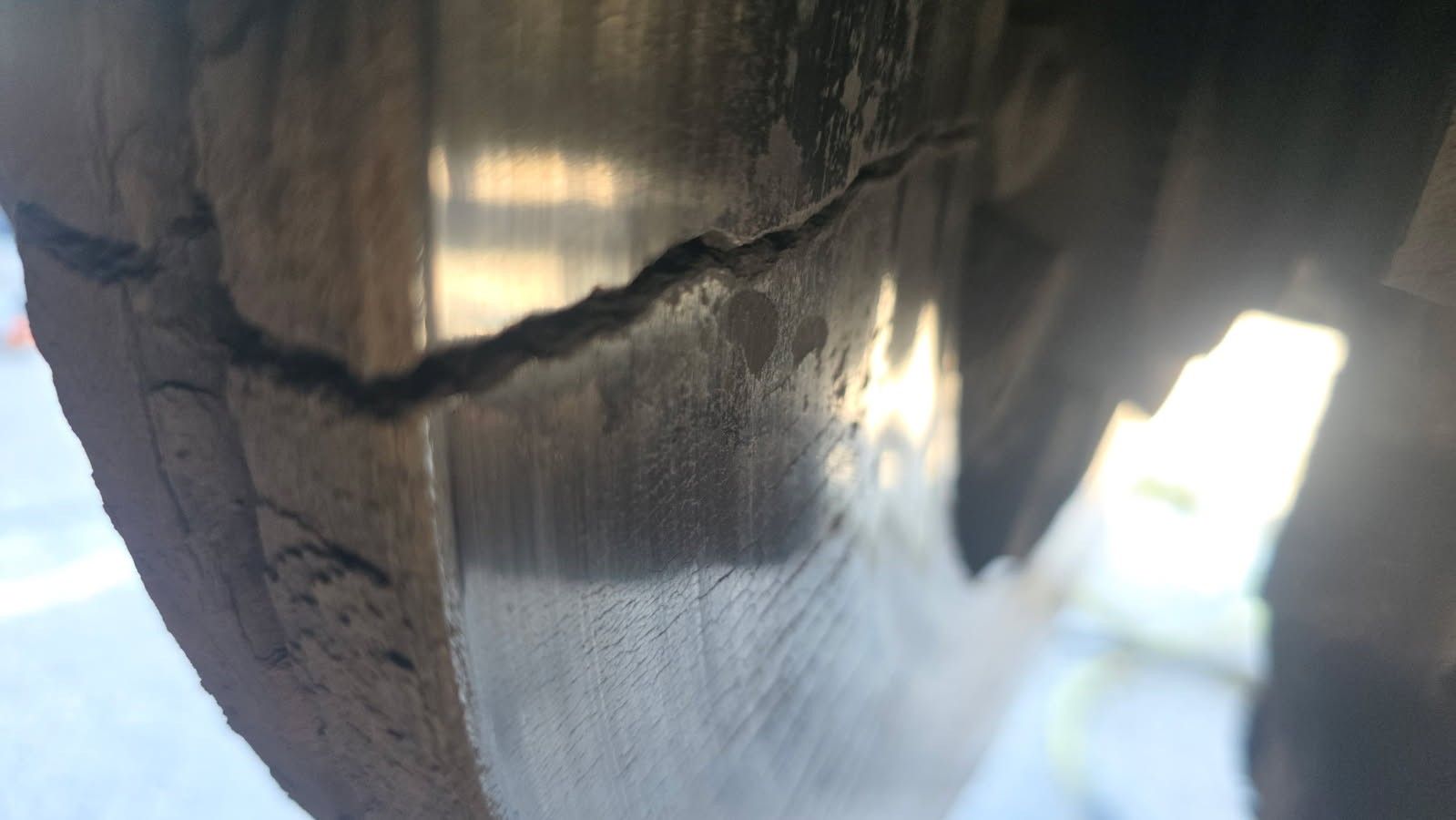 Close-up of a heat-cracked brake drum, an out-of-service defect